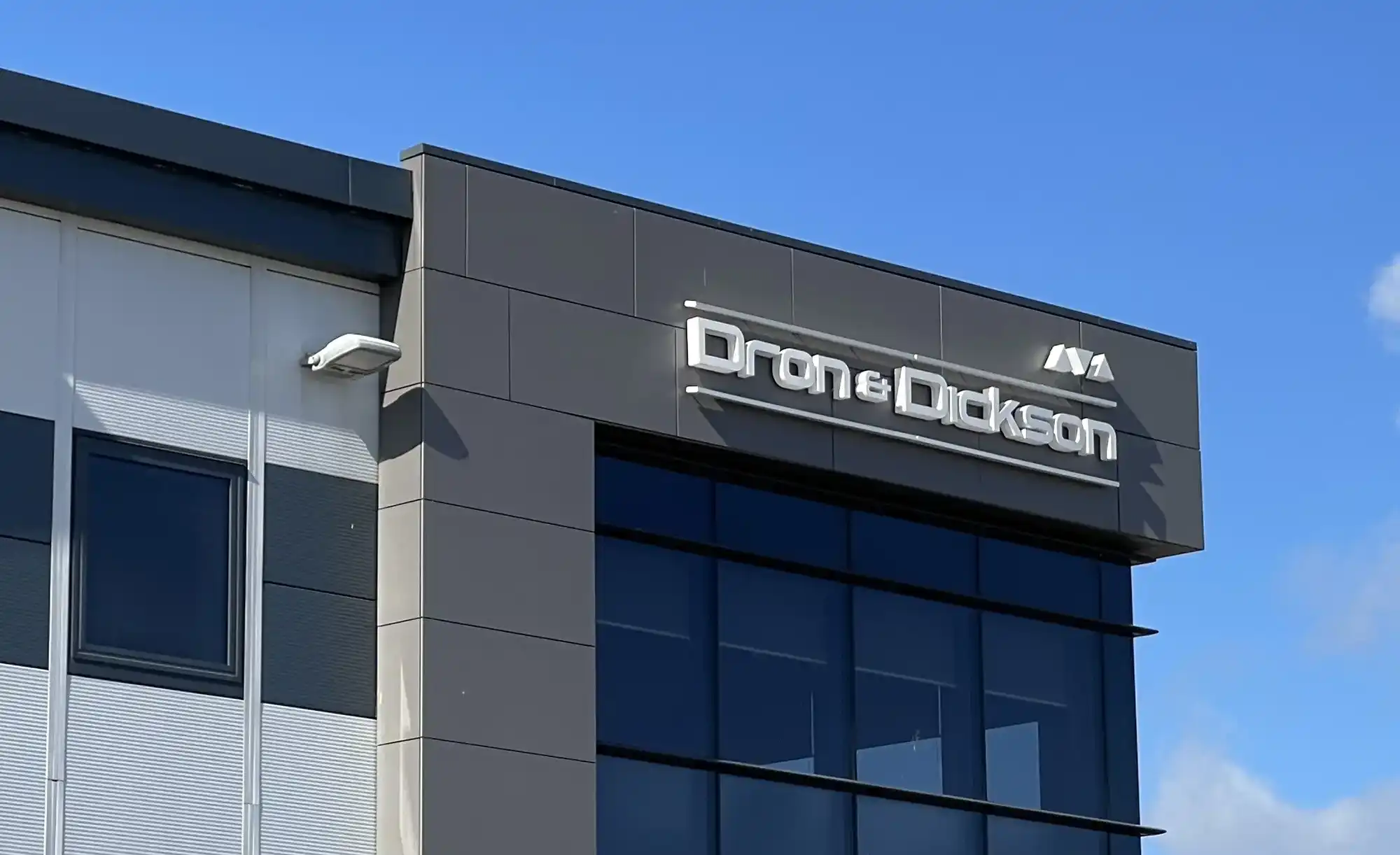 dron and dickson logo on office building