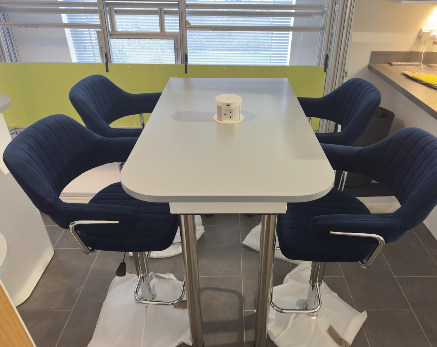 Bespoke table with pop-up USB power hub